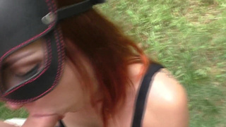 SKIP Blowjob In The Woods From The Redheads In A Leather Mask - 720p.mp4
