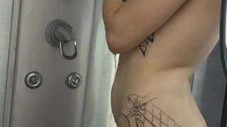 I like to play with a dildo in the shower.mp4